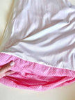 Mini dress rosa in tessuto stretch con micro paillettes trasparenti termo-adesive “La Perla”