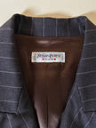 Blazer doppiopetto in rasato di lana grigio gessato con maxi bottoni neri  “Yves Saint Laurent”
