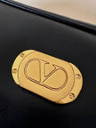 Beauty case in ecopelle nera “Valentino Garavani”