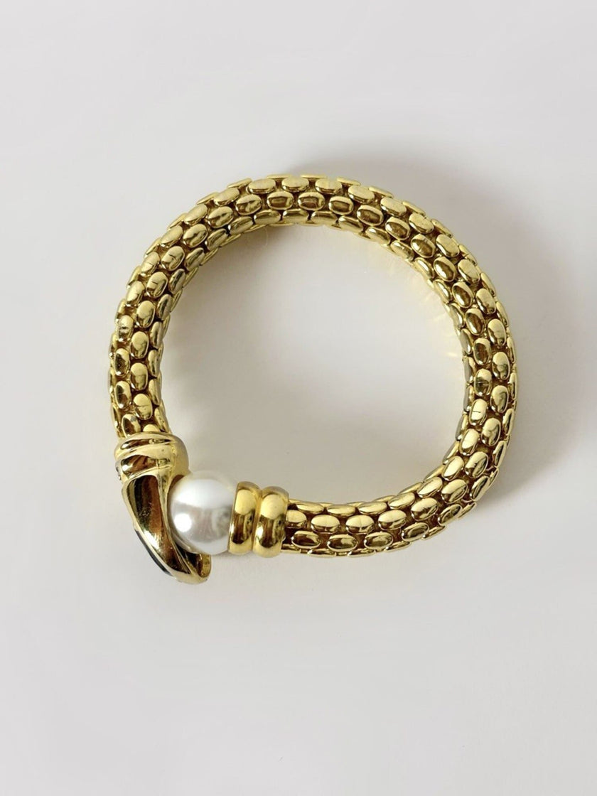 Bracciale vintage in metallo dorato con perla onice nero e cristalli
