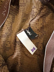 Collant Yves Saint Laurent in lycra fantasia pitone nei toni del beige bronzo e marrone