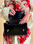 Borsa in pelle nera in stampa tejus 