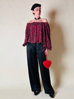 Blusa in seta nera con bocche e cuori rossi “Yves Saint Laurent”
