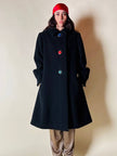 Cappotto nero con maxi bottoni gioiello multicolor “Yves Saint Laurent”