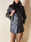 Dunkelbraune Vintage-Lederjacke mit integrierter Weste