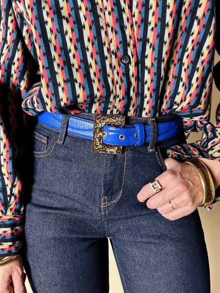 Cintura vintage Yves Saint Laurent in pelle bluette con fibbia gioiello dorata
