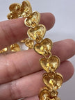Vintage Degerny necklace with ornate gold hearts