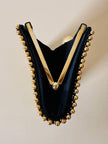 Clutch gioiello in seta nera con armatura di perline dorate “Rodo”