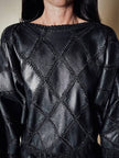 Blusa vintage in pelle nera patchwork con lavorazione crochet e maniche a pipistrello