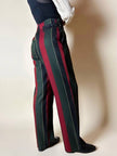 Pantalone a vita alta in lana jacquard a righe verticali con cinturini in pelle nera