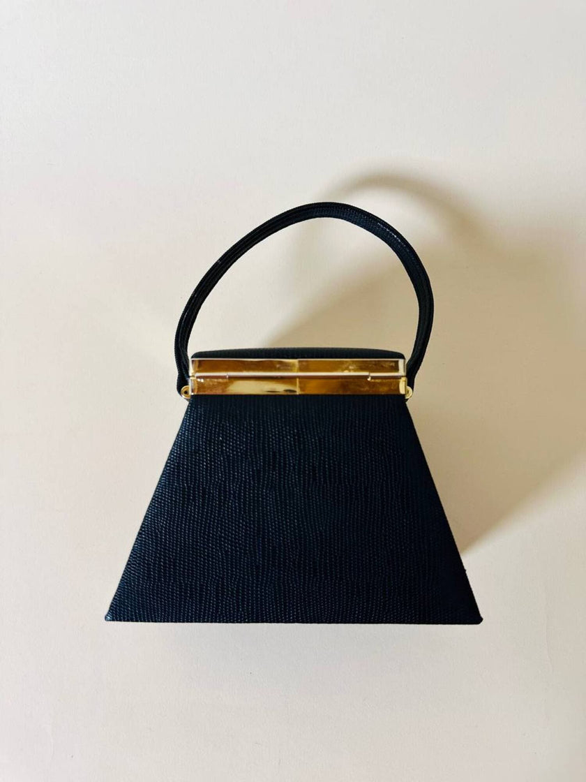 Mini bag a trapezio in ecopelle nera stampa lizard