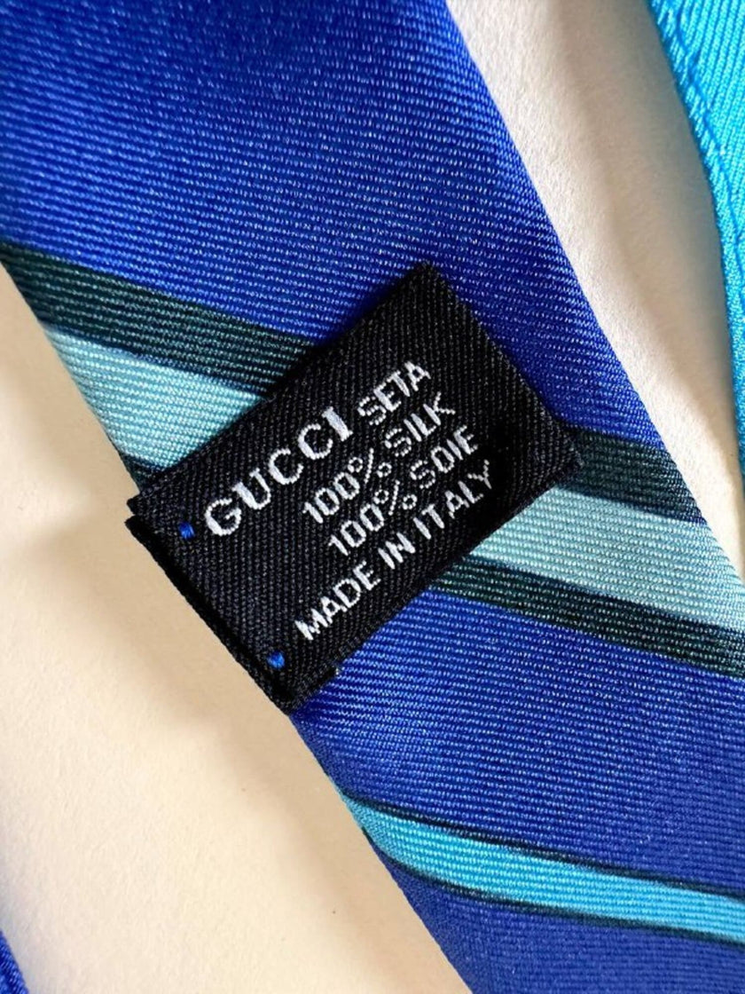 Top a fazzoletto in pura seta fantasia floreale nei toni blu “Gucci”