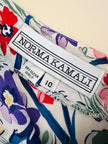 Gonna lunga a balze fantasia floreale “Norma Kamali”