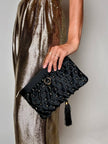 Pochette vintage Rodo in raso nero lavorato a rete con nappa couture e tracolla in catena