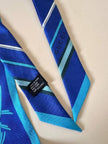 Top a fazzoletto in pura seta fantasia floreale nei toni blu “Gucci”