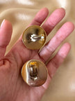 Orecchini a clip in paillettes argento con base dorata