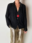 Camicia vintage in seta nera Yves Saint Laurent con logo YSL allover e bottoni in Jet