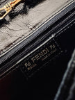 Borsa vintage Fendi in pelle verniciata nera con cuciture concentriche