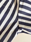 Moschino blue and white striped wrap blouse with embroidered peace symbol