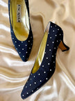 Décolleté in tessuto nero a pois bianchi “Escada”