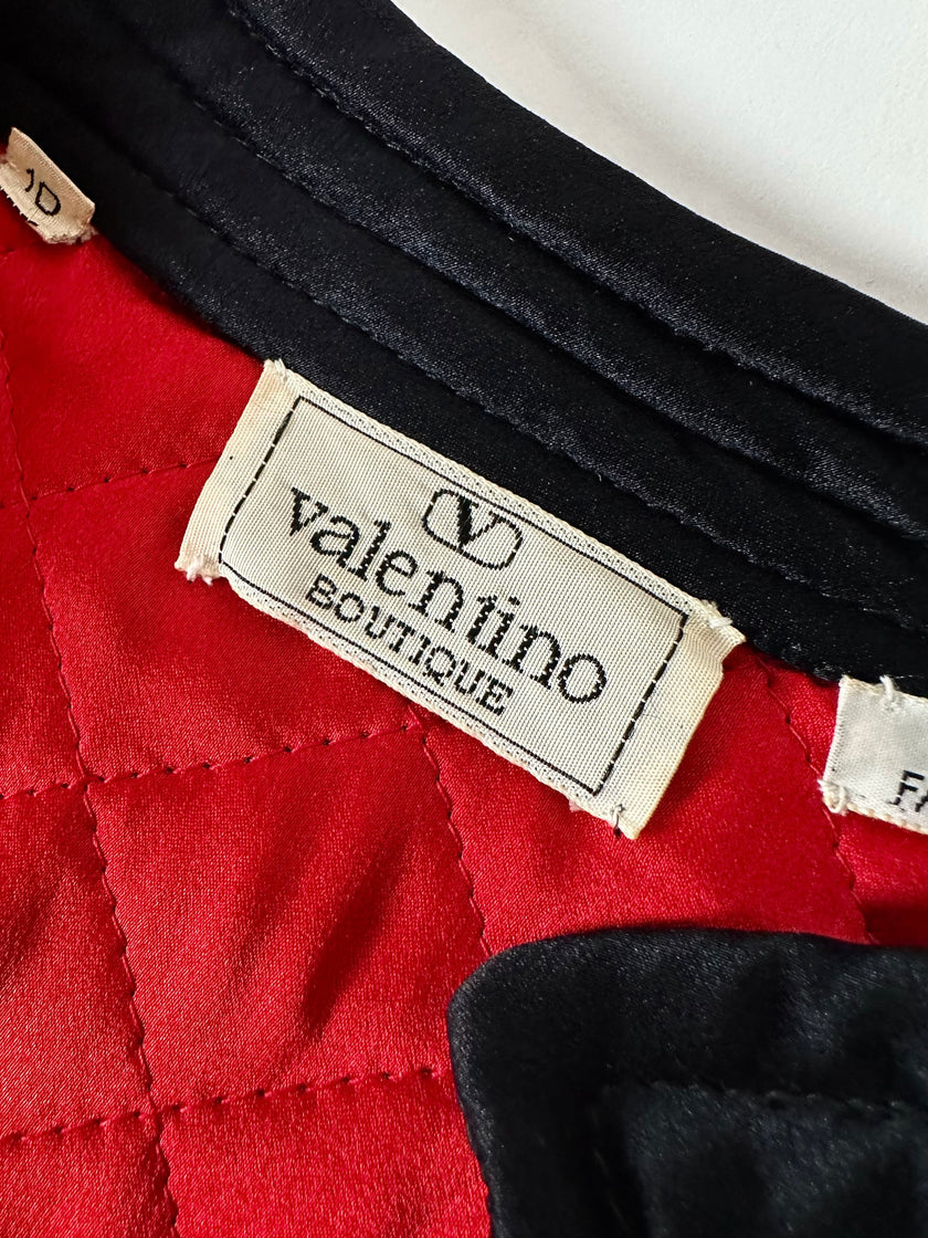 Bomber vintage Valentino Boutique in raso di seta nera trapuntato con fodera rossa