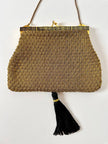 Borsa vintage Art Déco in lamé oro intrecciato con chiusura gioiello e nappa couture