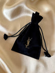 Maxi orecchini a clip dorati con logo YSL 