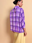 Blusa in seta lilla con maxi fiocco