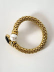Bracciale vintage in metallo dorato con perla onice nero e cristalli