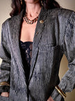 Spillone vintage Yves Saint Laurent dorato con pepita martellata