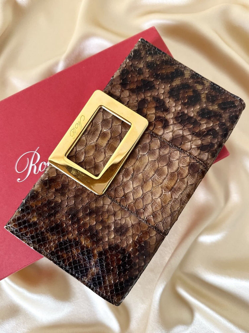 Vintage Roger Vivier leopard-print python clutch with a distinctive rectangular gold-tone metal clasp