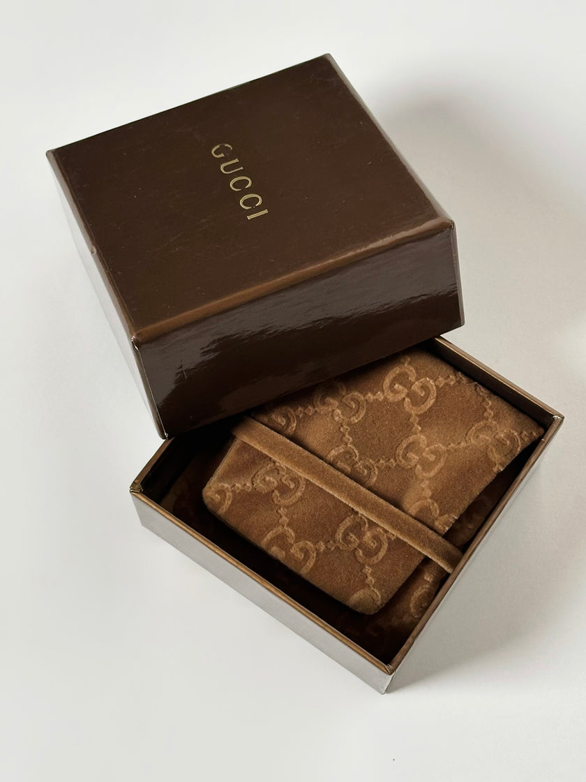 Collana vintage Gucci dorata con piccola bottiglia porta profumo