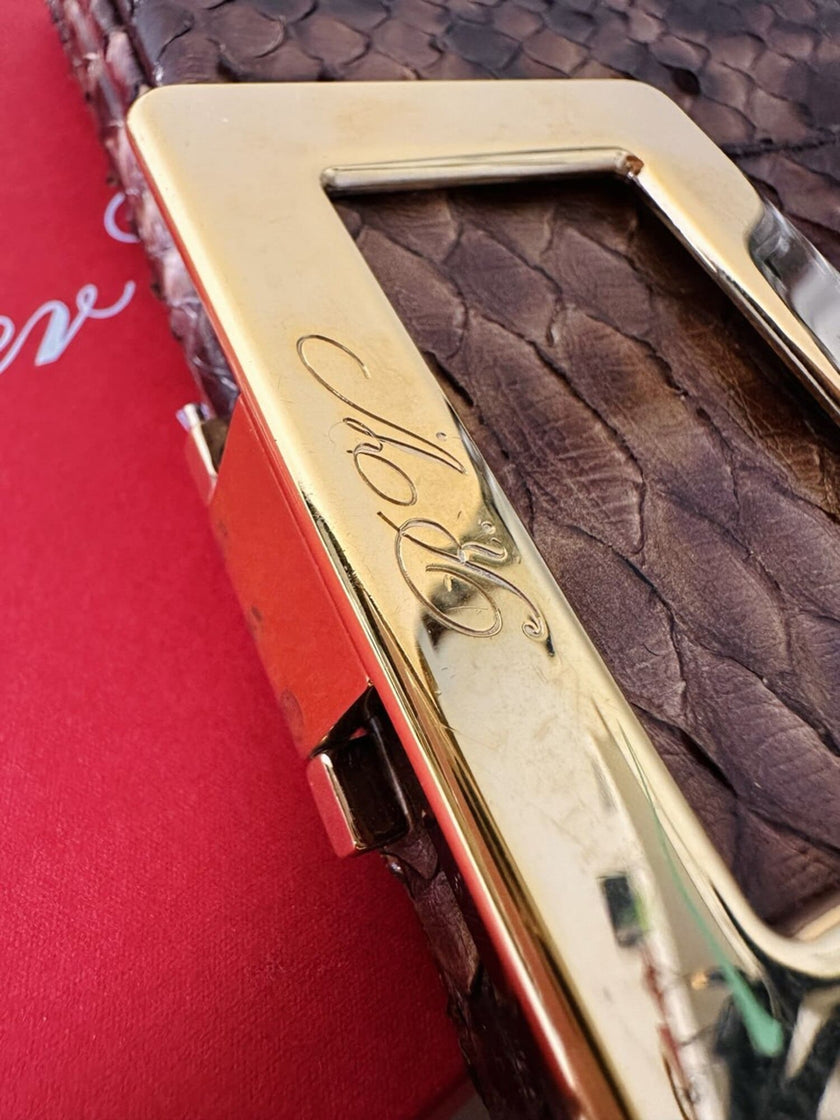Vintage Roger Vivier leopard-print python clutch with a distinctive rectangular gold-tone metal clasp