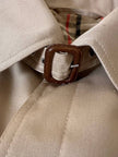 Trench color sabbia con fodera tartan “Idrostop”