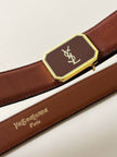 Vintage Yves Saint Laurent tan leather belt with an octagonal enamel buckle and YSL logo