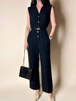 Jumpsuit Sportmax nera con abbottonatura frontale e pantalone con piega