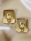 Maxi orecchini a clip dorati con logo YSL 