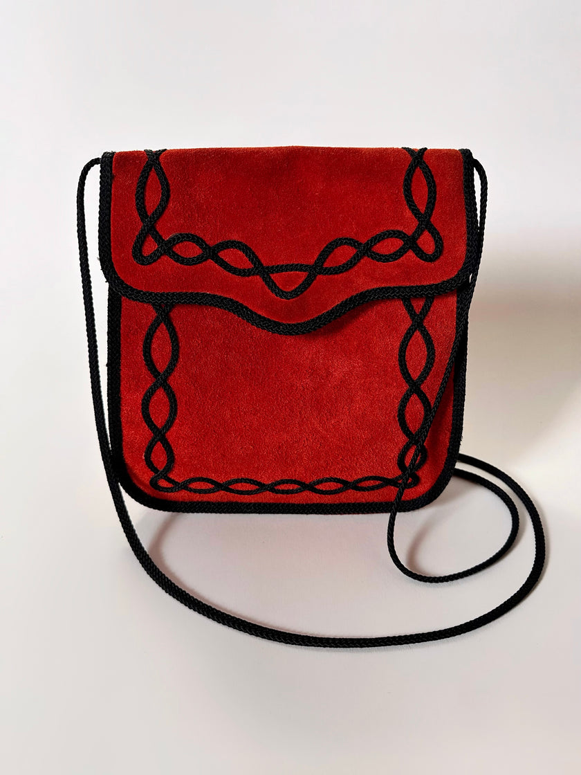 Borsa vintage Yves Saint Laurent in camoscio rosso con passamaneria nera
