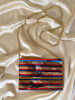 Pochette à lamelles miroirs multicolores avec bandoulière chaîne