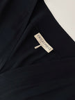 Jumpsuit vintage Emilio Pucci nera con maniche a pipistrello e nappa couture