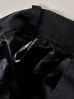 Gonna vintage Yves Saint Laurent Variation in raso nero con bottoni gioiello