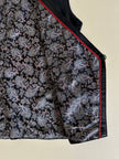 Gilet vintage in pelle nera modello doppiopetto con bottoni gioiello e fodera fantasia cachemire