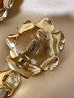 Clip dorate a forma di fiore con perle pendenti “Yves Saint Laurent”