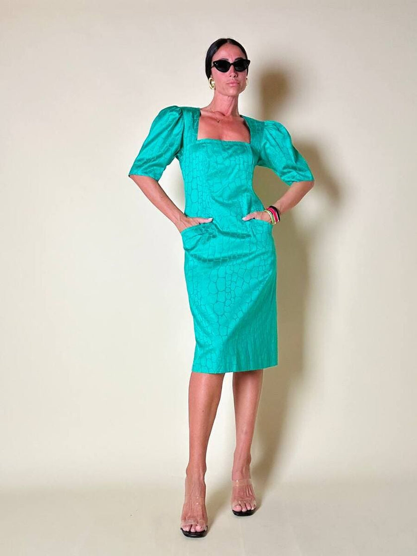 Abito verde smeraldo con abbottonatura posteriore “Yves Saint Laurent”