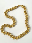 Vintage Degerny necklace with ornate gold hearts