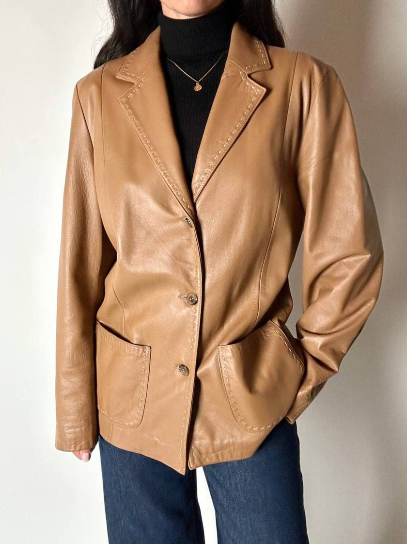 Vintage tan leather jacket with hand-stitched detailing by Claude Collections
