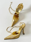 Décolleté slingback Gianni Versace in pelle laminata oro con punta affusolata lacci alla caviglia e tacco gioiello