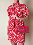 Mini abito rosso in seta jacquard a pois con fusciacca in coordinato “Fendi”