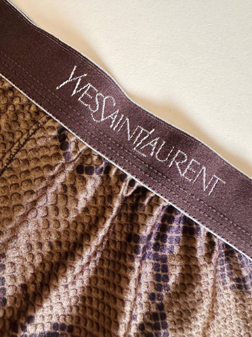 Collant Yves Saint Laurent in lycra fantasia pitone nei toni del beige bronzo e marrone