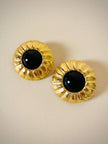 Clip oro con cabochon nero